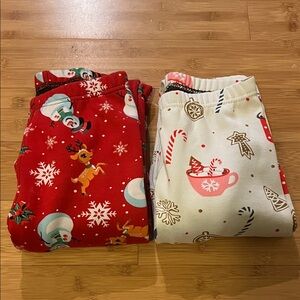 2 pairs of Just Cozy kids Christmas fleece lined leggings